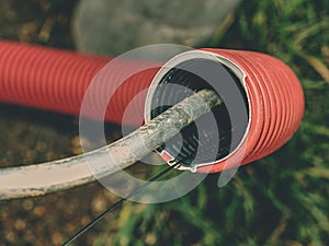 Steel earthingÂ  wire in ribbed flexible and plastic tube